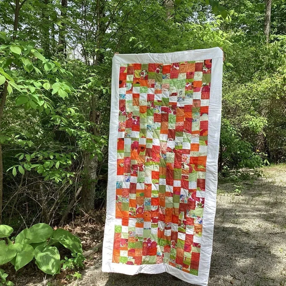 New With Tags.  Bright Summer Orange and Green Garden Coin Lap Quilt
